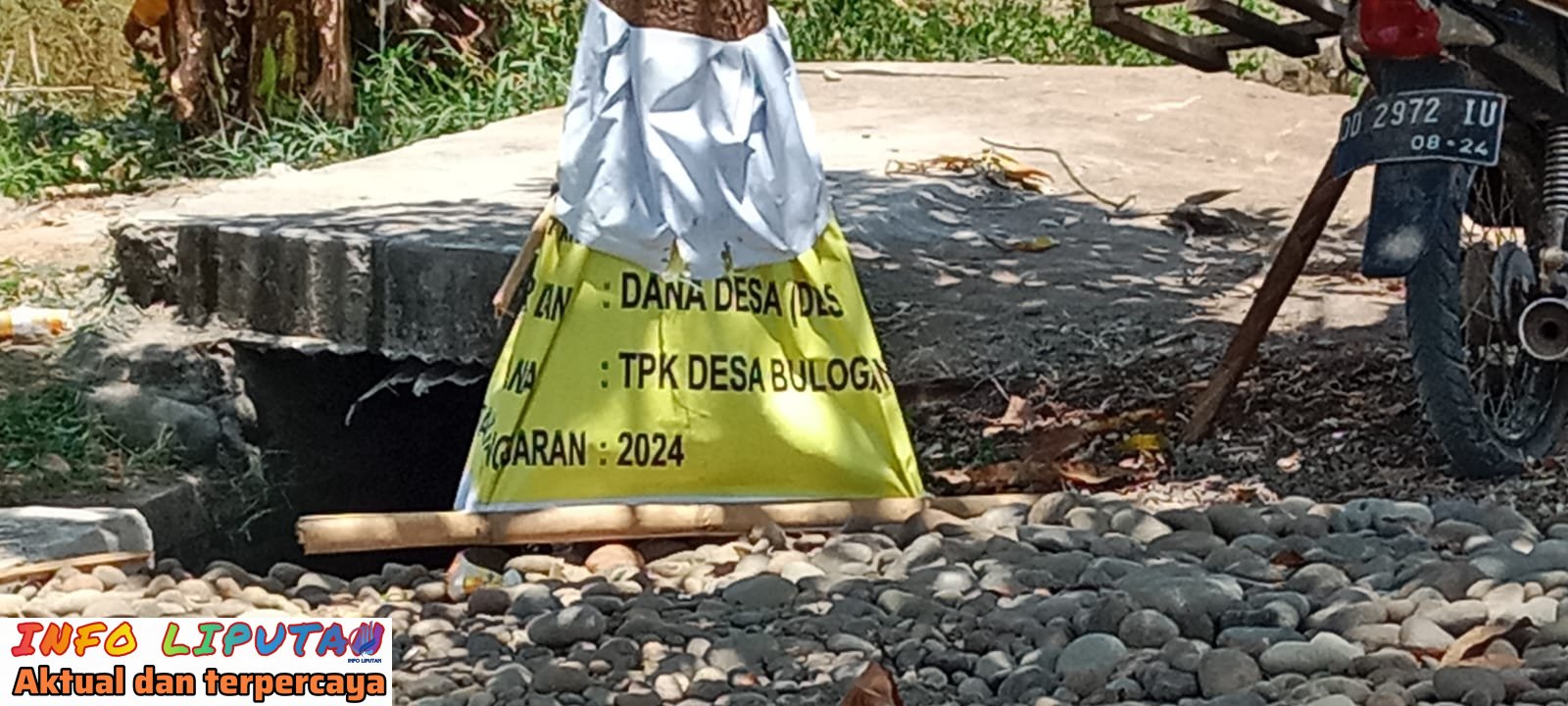 Dililit Begitu saja Dibatang Pohon, Papan proyek Jalan Tani di Desa Bulogading,Mendapat Sorotan!!
