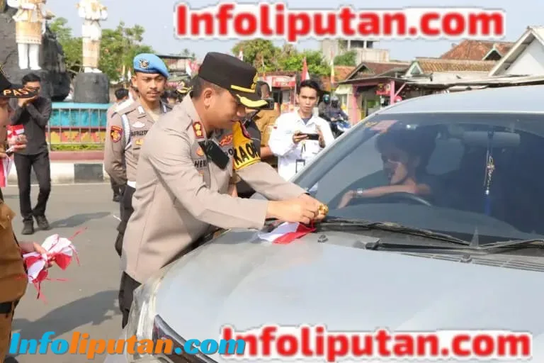 Polres Pesawaran Bagikan 2.200 Bendera Merah Putih Sambut HUT RI ke-80
